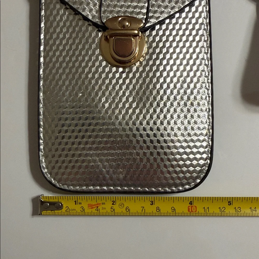Cruise Club Metallic Silver Crossbody Pouch/Bag with Gold Lock. 2 Compartments